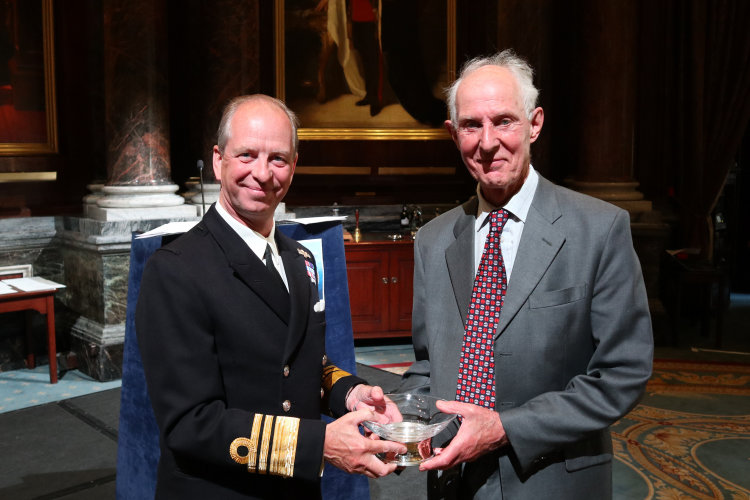 Vice Admiral Jerry Kyd CBE presents Julian Parker OBE with the Maritime Fellowship Award 2021 at the Maritime Media Awards 2020 and 2021 as the Maritime Foundation returned to Londons Drapers Hall on Friday, 27 May 2022 at a reception and lunch attended by a diverse representation of the maritime community and the past two years of the book, film, digital media, and journalism award winners.